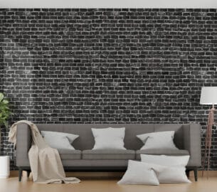 Mur de Briques Noires Film adhésif imitation mur de briques noires appliqué à un mur dans un salon moderne